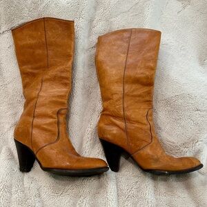 Leather, calf length woman’s boots